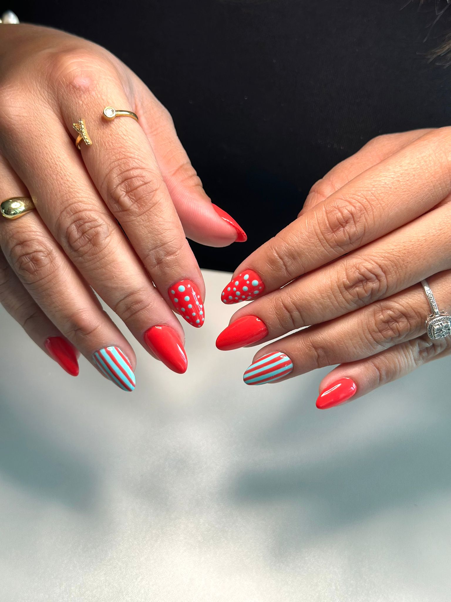 Red nail art tips.